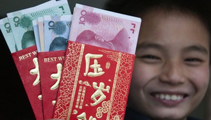 Nhu cầu tiền mặt cận Tết của người Trung Quốc đang lên rất cao. Ảnh: China Daily.