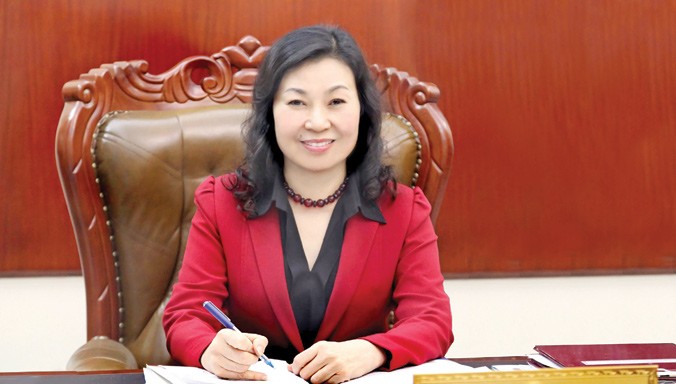 Bà Nguyễn Thị Minh, Thứ trưởng, Tổng giám đốc BHXH Việt Nam.