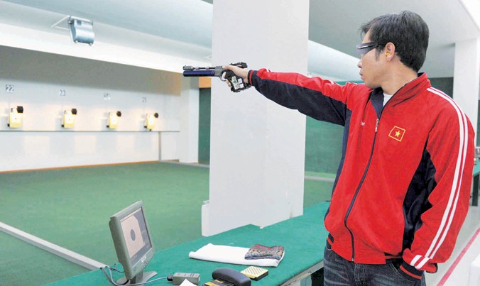Xạ thủ Hoàng Xuân Vinh - người đoạt giải vô địch châu Á (2012) và vô địch thế giới (2013) nội dung 10m súng ngắn hơi tiêu chuẩn.