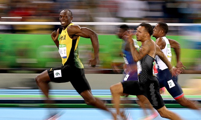 Với nước rút thần tốc, Usain Bolt vẫn không có đối thủ trên đường chạy 100m. Ảnh: GETTY IMAGES.