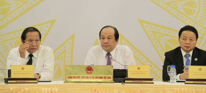Bộ trưởng, Chủ nhiệm VPCP Mai Tiến Dũng trả lời tại cuộc họp báo. Ảnh: Trường Phong.