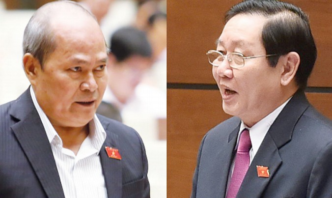 Đại biểu Ngô Văn Minh (trái) đã có những chất vấn nảy lửa về công tác cán bộ đối với Bộ trưởng Nội Vụ Lê Vĩnh Tân (phải). Ảnh: Như Ý.