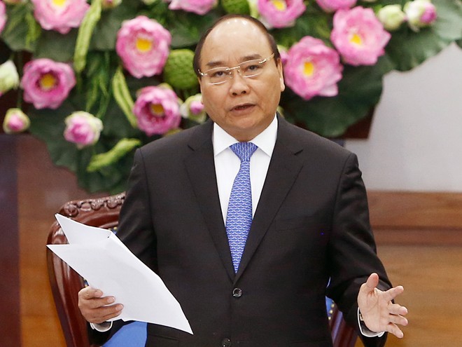 Thủ tướng Nguyễn Xuân Phúc phát biểu tại Hội nghị trực tuyến với các tỉnh thành ngày 28/12. Ảnh: TTXVN.