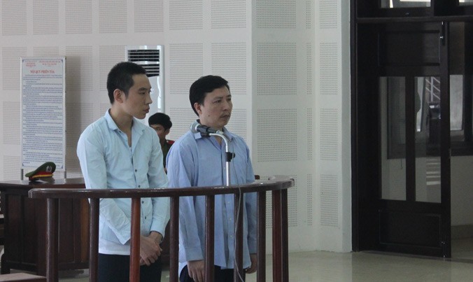 Bị cáo Ping Sanshi và Hao Yanjun tại tòa.