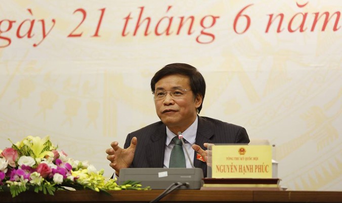 Tổng Thư ký Quốc hội Nguyễn Hạnh Phúc tại buổi họp báo. Ảnh: Như Ý.