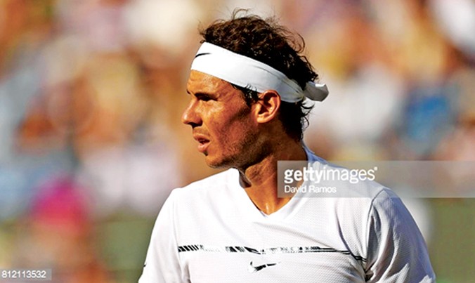 Lần thứ 5 Nadal không thể góp mặt ở tứ kết Wimbledon. Ảnh: GETTY IMAGES.