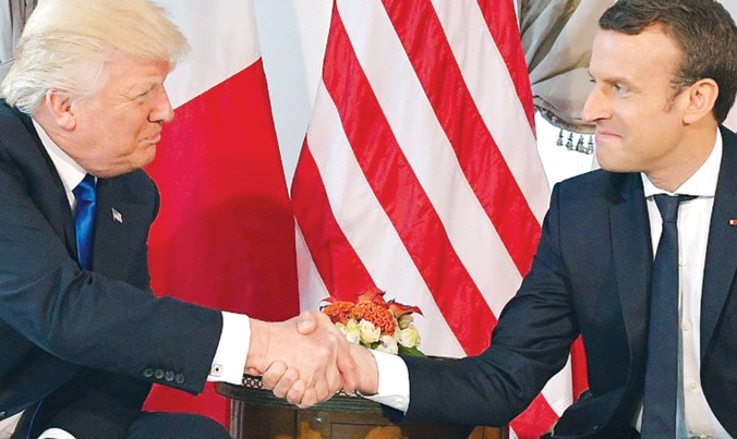 Tổng thống Mỹ Donald Trump (trái) và Tổng thống Pháp Emmanuel Macron. Ảnh: Getty Images.