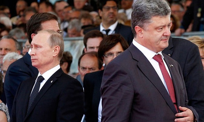 Tổng thống Nga Putin (trái) và tổng thống Ukraine Poroshenko.
