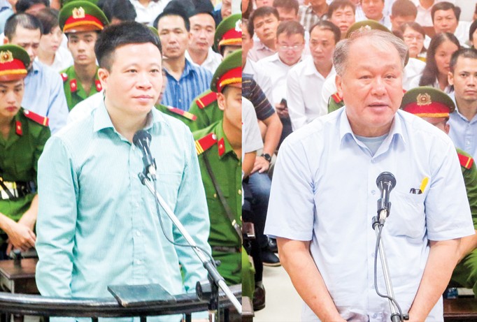 Các bị cáo Hà Văn Thắm (bìa trái), Phạm Công Danh trả lời HĐXX.