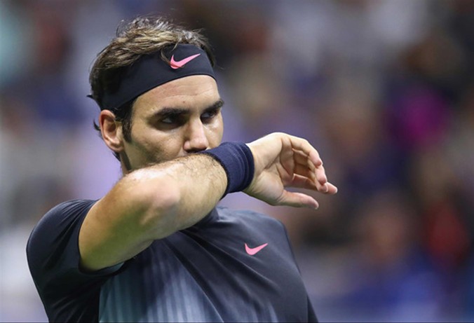 Roger Federer “tránh” được việc phá lời nguyền ở Grand Slam cuối cùng trong năm sau khi bị Del Potro loại ở tứ kết. Ảnh: GETTY IMAGES.