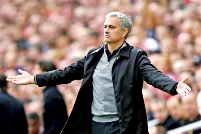 HLV Mourinho khẳng định muốn gắn bó lâu dài với M.U. Ảnh: GETTY IMAGES.