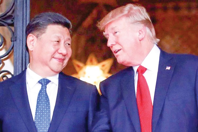 Tổng thống Mỹ Donald Trump và Chủ tịch Trung Quốc Tập Cận Bình trong lần gặp vào tháng 4/2017 tại khu nghỉ dưỡng Mar-a-Lago của ông Trump. Ảnh: Alex Brandon.