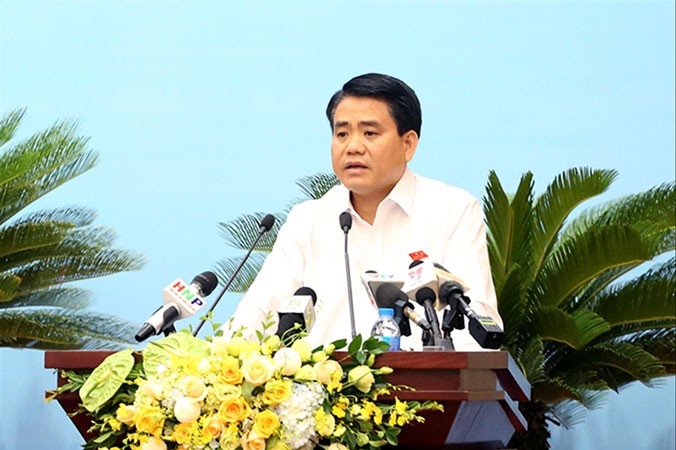 Chủ tịch UBND thành phố Hà Nội Nguyễn Ðức Chung phát biểu tại phiên giải trình.