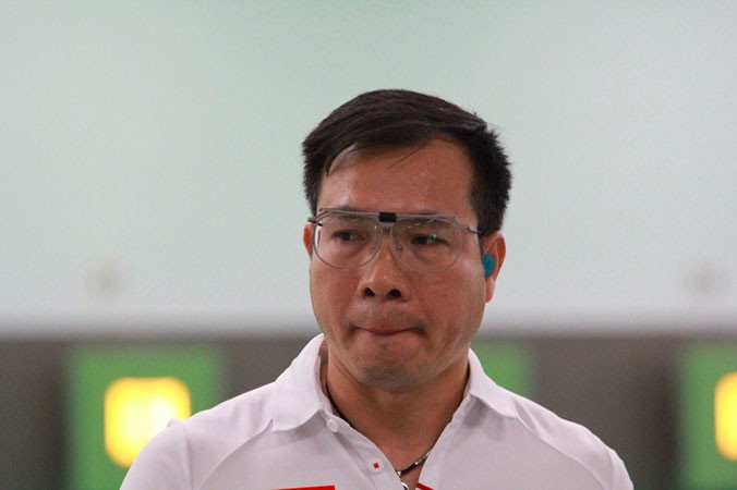 Hoàng Xuân Vinh tiếp tục đón nhận thất bại ở Asiad 2018, tại nội dung từng đưa anh lên đỉnh vinh quang ở Olympic 2016. Ảnh: VSI.