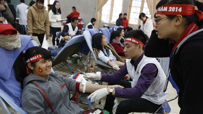 Chương trình hiến máu tình nguyện Chủ nhật Đỏ năm 2014. Ảnh: Hồng Vĩnh