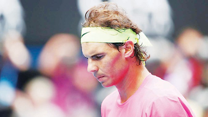 Nadal lộ vẻ thất vọng trong trận thua Berdych ở tứ kết. Ảnh: Getty Images