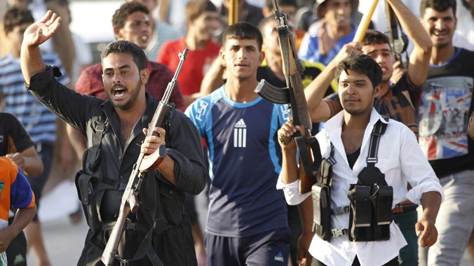Các tình nguyện viên Iraq tham gia chiến dịch tấn công IS. Ảnh: New York Post