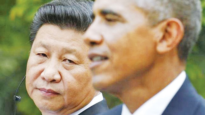 Chủ tịch Trung Quốc Tập Cận Bình (trái) trong cuộc họp báo chung với Tổng thống Mỹ Barack Obama hôm 25/9. Ảnh: Kevin Lamarque