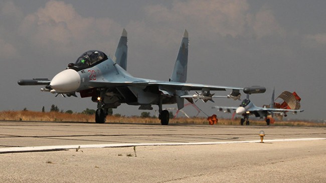 Máy bay ném bom Su-34 Nga tại căn cứ Latakia, Syria. Ảnh: Sputnik