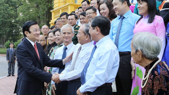 Chủ tịch nước Trương Tấn Sang với các đại biểu. Ảnh: TTXVN