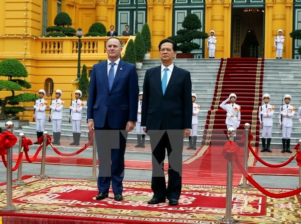 Thủ tướng Nguyễn Tấn Dũng và Thủ tướng New Zealand John Key. Ảnh TTXVN