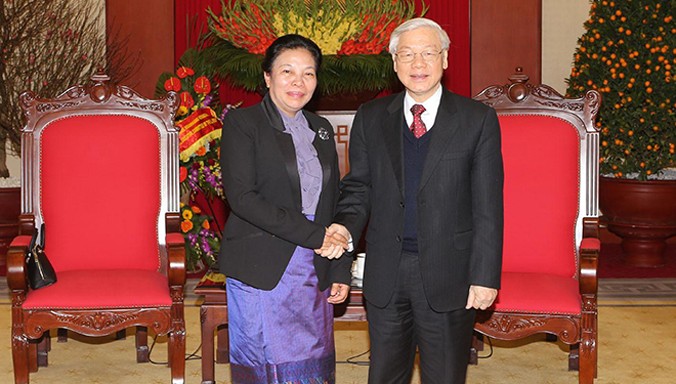 Tổng Bí thư Nguyễn Phú Trọng tiếp bà Sunthon Saynhachac - Đặc phái viên của Tổng Bí thư Đảng Nhân dân Cách mạng Lào. Ảnh: TTXVN