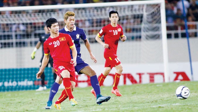 Các tuyển thủ VN dưới sự dẫn dắt của HLV nội Nguyễn Hữu Thắng được giao chỉ tiêu vào tới chung kết AFF cup 2016. Ảnh: VSI