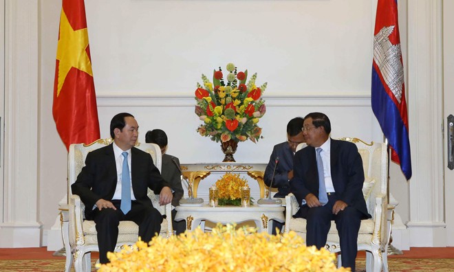 Chiều 15/6, Chủ tịch nước Trần Đại Quang gặp Thủ tướng Campuchia Hun Sen. Ảnh: TTXVN