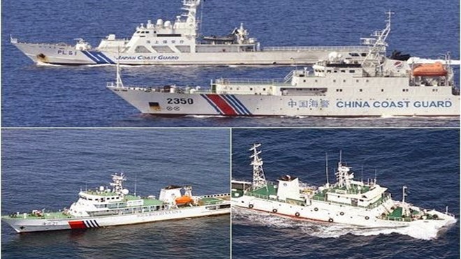 Tàu hải cảnh Trung Quốc và Nhật Bản vờn nhau trên biển Hoa Đông. Ảnh: Getty Images