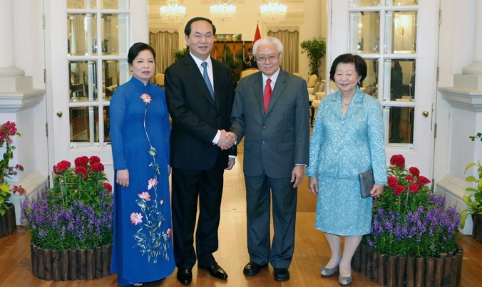 Chủ tịch nước Trần Đại Quang và Phu nhân cùng với Tổng thống Singapore Tony Tan Keng Yam và Phu nhân. Ảnh: TTXVN