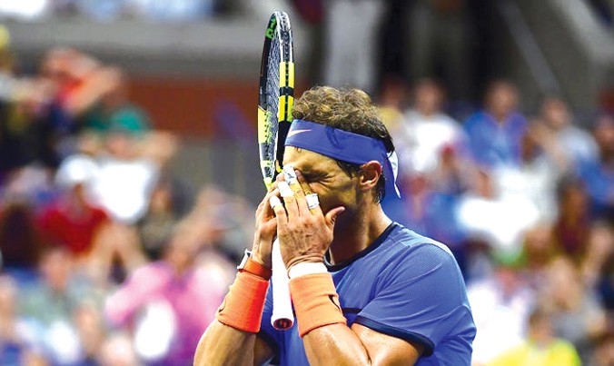 Nadal thất vọng sau khi bị loại khỏi US Open ngay từ vòng 4. Ảnh: GETTY IMAGES