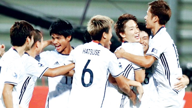 Các cầu thủ U19 Nhật Bản ăn mừng chiến thắng trước U19 Việt Nam để giành quyền vào chơi trận chung kết. Ảnh: AFC