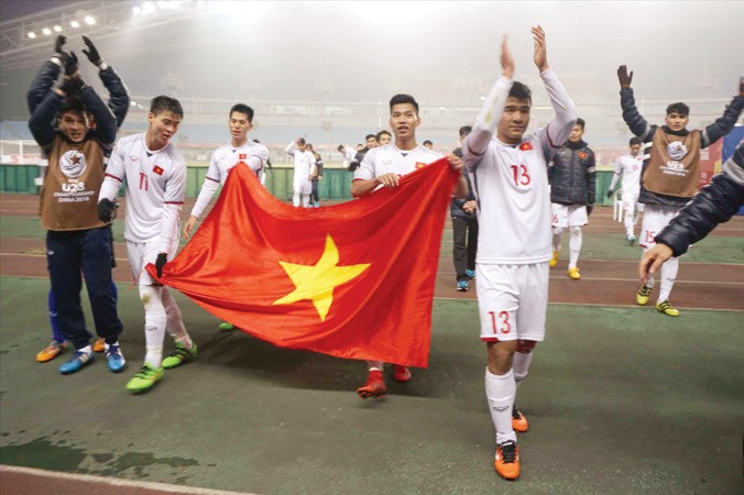 Các cầu thủ U23 Việt Nam ăn mừng thành tích lịch sử ở VCK U23 châu Á. Ảnh: Hữu Phạm.