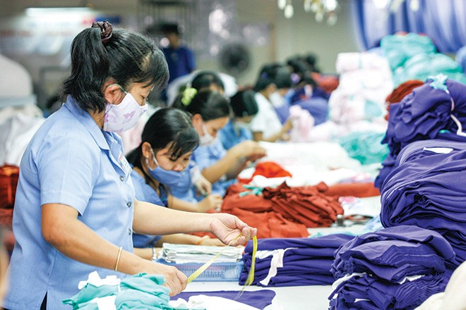 Doanh nghiệp dệt may đã bắt đầu dành một nguồn lực đầu tư lớn vào các công nghệ hiện đại. Ảnh: Minh Châu