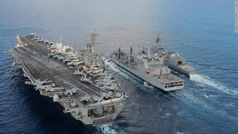 Tàu sân bay Mỹ USS Theodore Roosevelt và tàu khu trục JS Fuyuzuki của Nhật Bản đi cùng tàu hậu cần INS Shakti của Ấn Độ trong tập trận Malabar 2015 Ảnh: CNN