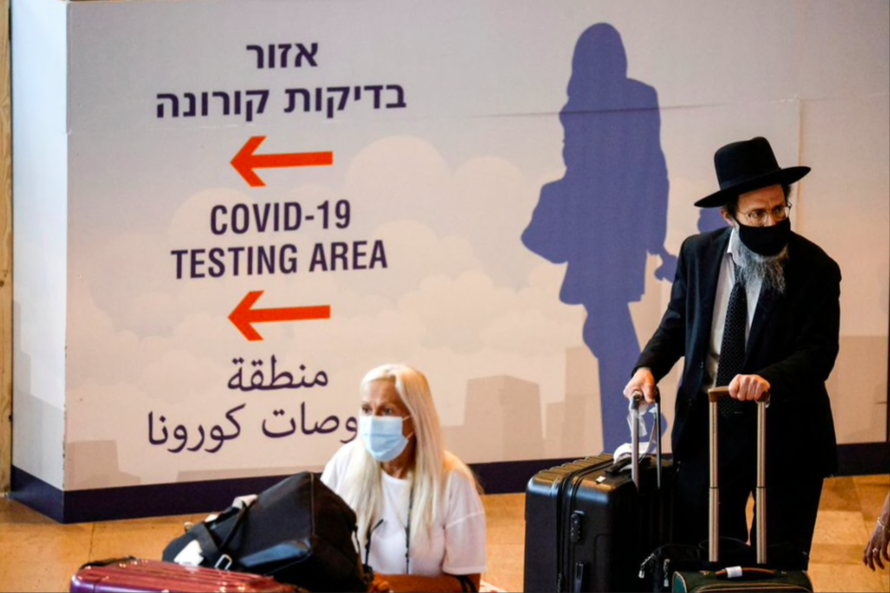 Du khách đến sân bay quốc tế Ben Gurion của Israel ngày 8/7 Ảnh: Getty