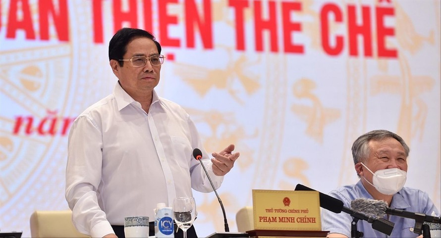 Thủ tướng Phạm Minh Chính phát biểu tại Hội nghị toàn quốc về công tác xây dựng và hoàn thiện thể chế Ảnh: Nhật Minh 