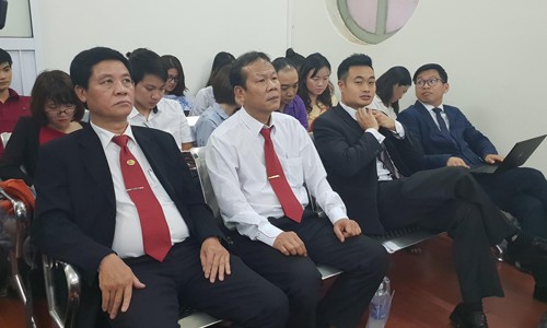 Đại diện Vinasun và Grab tại phiên tòa Ảnh: Văn Minh