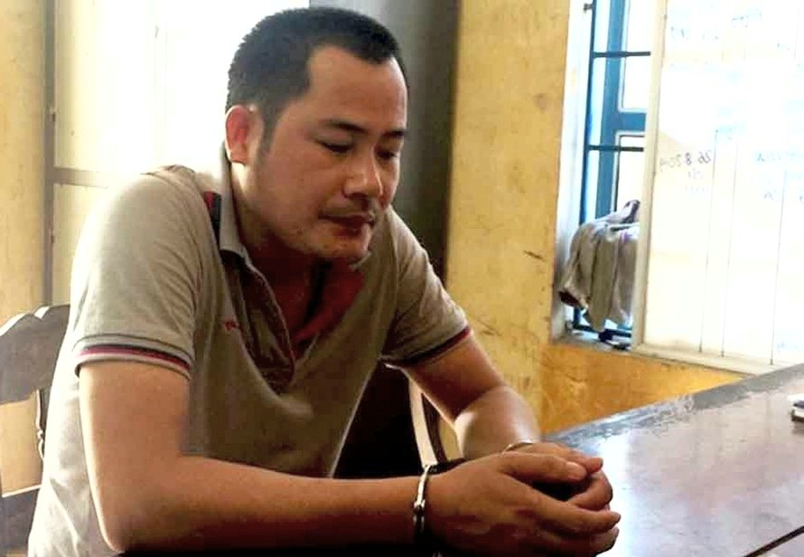 Đối tượng Nguyễn Thành Đạt bị tạm giữ để phục vụ điều tra. Ảnh: CA.