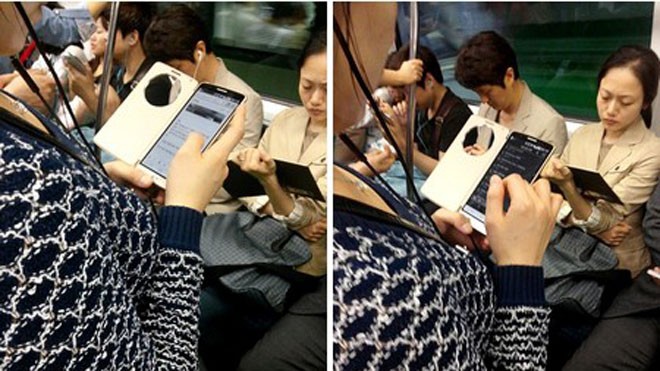 Hình ảnh LG G3 được bắt gặp sử dụng trên tàu điện ngầm, với lớp vỏ bảo vệ có lỗ hình tròn khá lạ mắt 