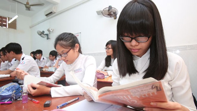 Học sinh lớp 12 Trường THPT Bùi Thị Xuân (TP.HCM) trong giờ học môn văn - Ảnh: Đào Ngọc Thạch (Thanh Niên)