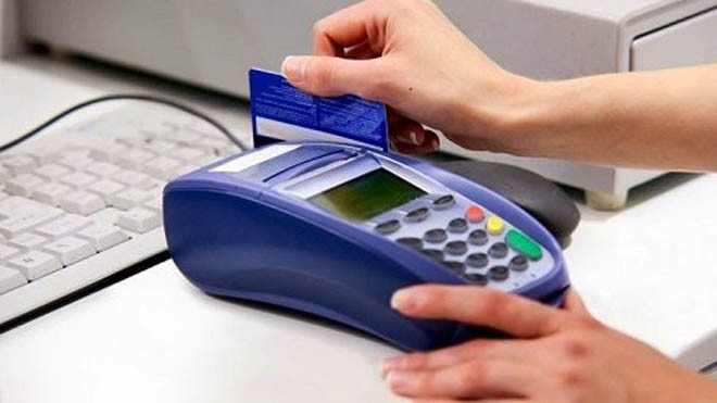Ngân hàng Nhà nước cảnh báo tình trạng dùng thẻ giả rút tiền qua P.O.S. Ảnh: PV