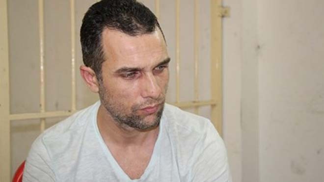 Đối tượng Ivan Slavov Rusev bị bắt tại TP HCM. Ảnh: Phùng Bắc