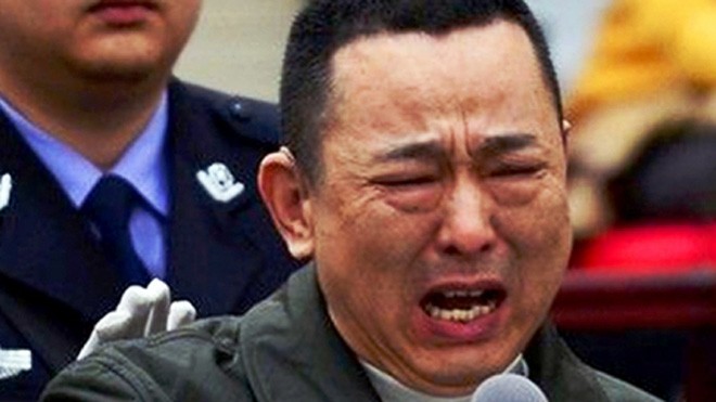 Lưu Hán khóc tại phiên tòa tháng 5-2014. Ảnh: SCMP