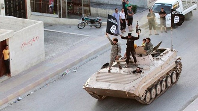 IS vẫn đang hoành hành ở Iraq, Syria và vươn ra nhiều nước khác - Ảnh: Reuters