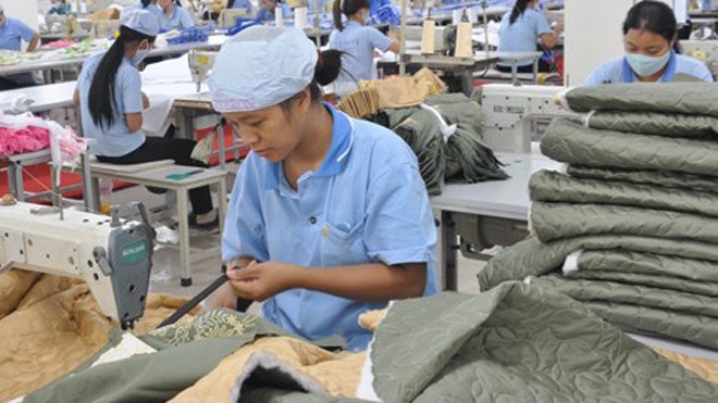 Mỗi lao động Việt Nam làm ra 74 triệu đồng trong năm 2014, theo Tổng cục Thống kê. Ảnh: Anh Quân