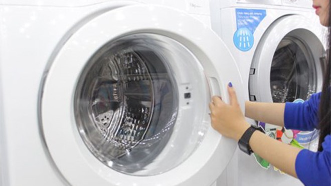 Máy giặt lồng ngang cũng có thể gây nguy hiểm cho trẻ nếu bất cẩn - Ảnh: minh họa