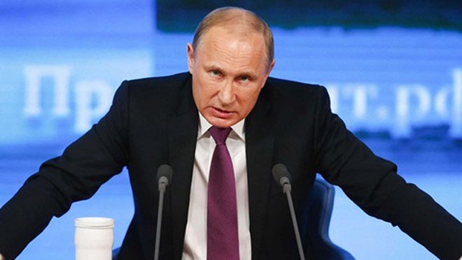Tổng thống Nga Vladimir Putin trong cuộc họp báo cuối năm 2014. Ảnh: Reuters