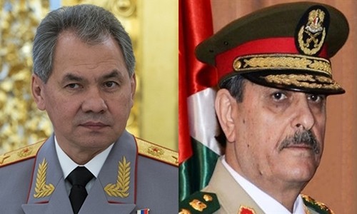 Bộ trưởng Quốc phòng Nga Sergei Shoigu (trái) và người đồng cấp Syria Fahed Jassem al-Freij.