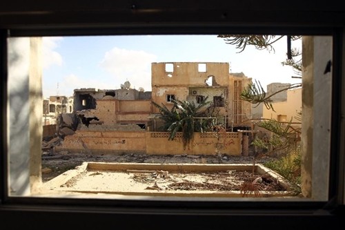 Một tòa nhà bị hư hại trong giao tranh ở thành phố Benghazi, Libya. Ảnh: AFP.
